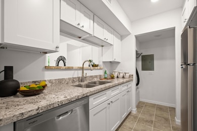Kitchen featuring appliances with stainless steel