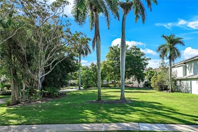 View of property's community featuring a lawn