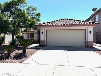 Mediterranean / spanish-style home with driveway,