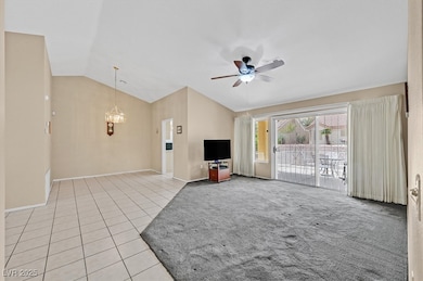 Living room/dininng room featuring light tile floo