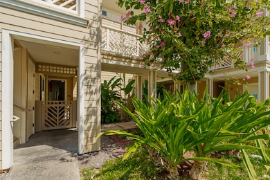 Private gated entry lanai on the ground floor—welcoming you with ease, security, and true indoor-outdoor island living.