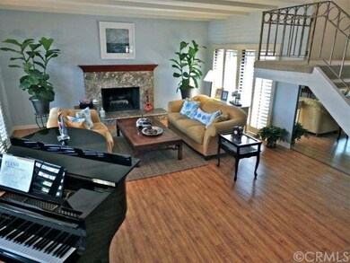 Spacious formal living room with fireplace 