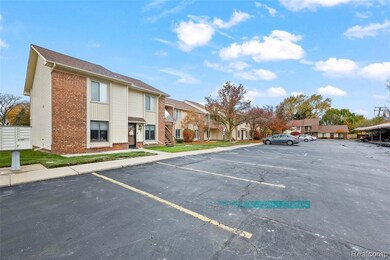 Uncovered parking lot with a residential view