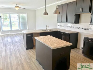 Photo taken 6.22.18. Kitchen towards living room. 