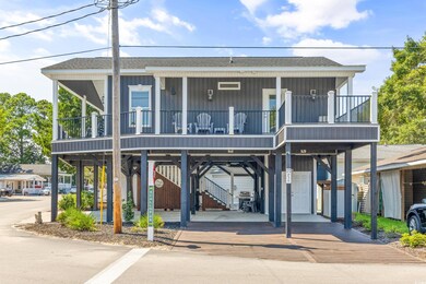 View of front facade featuring a carport