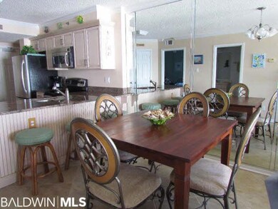 Counter seating and room for 6 at the table.