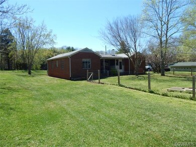 Parking area is on this side of house.