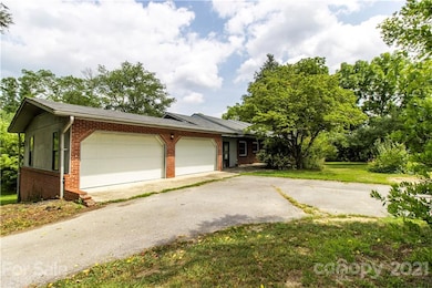 1669 Howard Gap Rd, Hendersonville, NC 28792 - photo 3