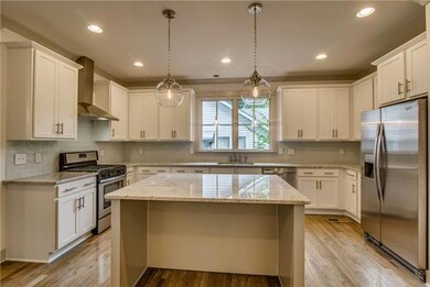 Clean, contemporary kitchen space by BM.  (Photo of a similar home by BM)