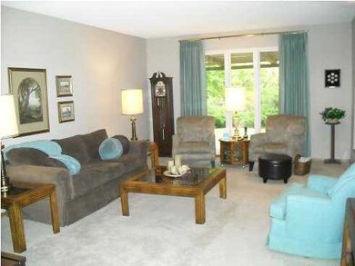 Large living area with nice window.