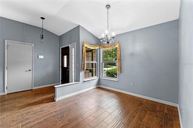 from left to right… garage door, front door, dining room