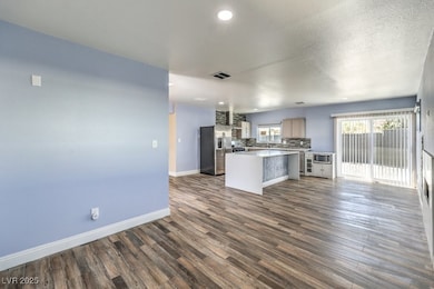 Kitchen featuring visible vents, backsplash, a kit