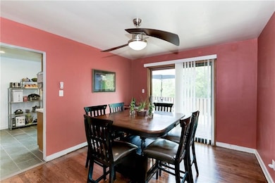 Just off the living room, hardwood floors continue into your dining area.