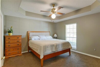 Master bedroom with tray ceiling. TV will remain w