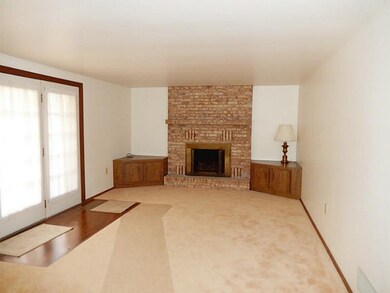 Family Room. 1st floor family room with brick fire