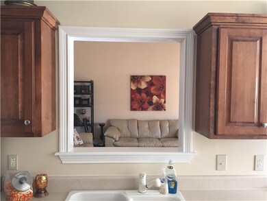 Pass through from kitchen into living room gives an open feeling!