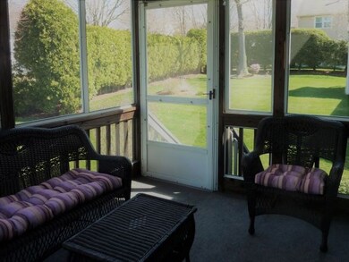 Screened porch off Dining Room including a slider