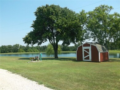 Front pond and storage bldg.