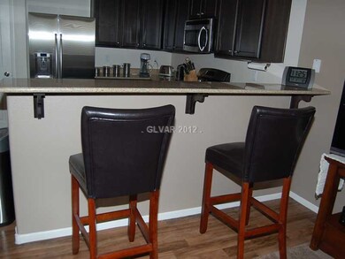 Kitchen. COUNTER HAS ROOM FOR FOUR BAR STOOLS