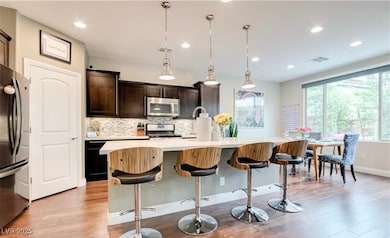 Kitchen featuring appliances with stainless steel
