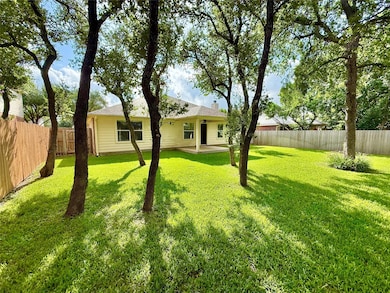 Fenced backyard featuring a patio area