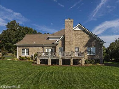 Exterior Back. All brick exterior. Custom built home. Perfect yard for pool!