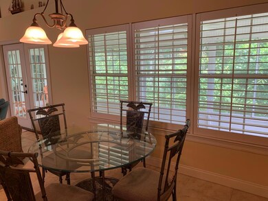 Dining area looking out private backyard