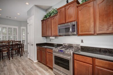 Staggered Cherry Cabinets