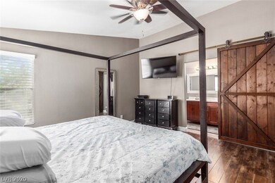 HUGE NASTER BEDROOM WITH ROLLING DOOR ACCESS TO MA