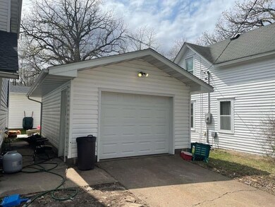 Single car garage for upper unit.