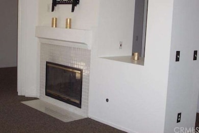 FIREPLACE IN FAMILY ROOM WITH TV BRACKET & ELECTRI