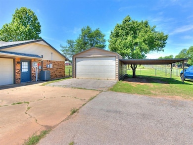 Garage featuring cooling unit and a garage