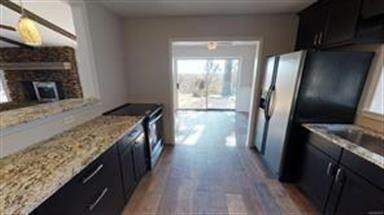 Kitchen with granite counter tops and NEW stove!