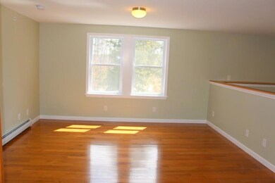 Spacious Living Room with Harwood...