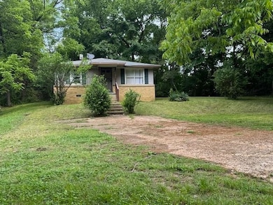 View of front of property featuring a front lawn