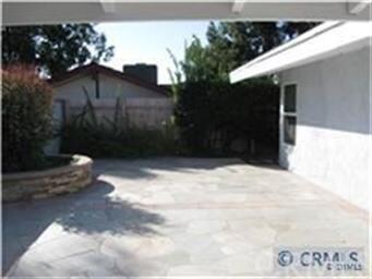The front patio is fully enclosed for privacy & se