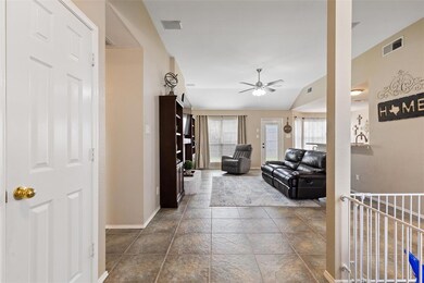 Warm and inviting entrance. Coat closet to left. F