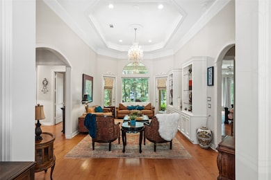 LIVING ROOM  Located just beyond the Foyer with sc