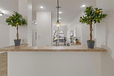 Kitchen featuring stainless steel range with elect