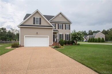 Beautiful aggregate driveway leads up to spacious