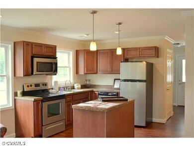 Kitchen - Photo is of a previously built home and 