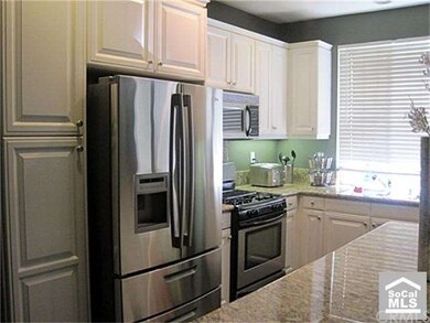 Kitchen with Stainless Steel Appliances and Granit