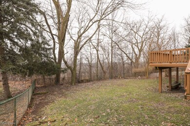 View of yard with a wooden deck