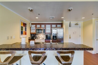 Kitchen with stainless steel appliances, visible v