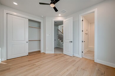 This is a bright, modern bedroom on the first floo