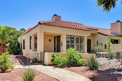 Mediterranean / spanish-style house with a chimney