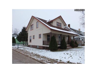 Corner lot with inviting front porch and fenced ba