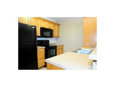Kitchen. Fresh neutral paint and matching high-eff