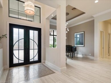Glass and wrought iron doors make a statement