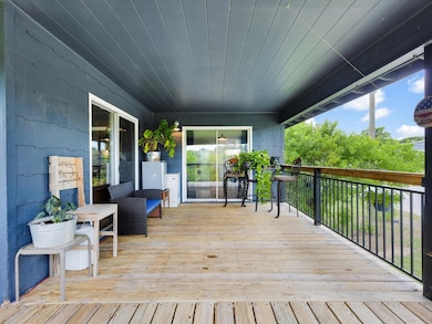 Wrap-around deck with built-in seating, lush green